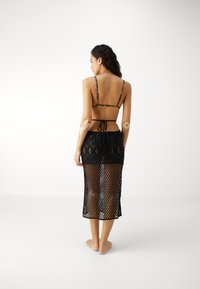 ONLY ONLFLORENCE SKIRT - Beach accessory - black