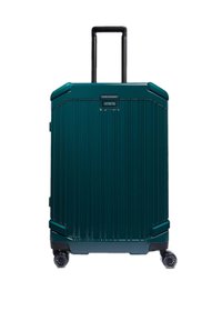 Donker teal harde koffer met verticale groeven, uittrekbare zwarte handgreep en vier wielen voor mobiliteit. Voorzien van een aanpasbare naamplaat.