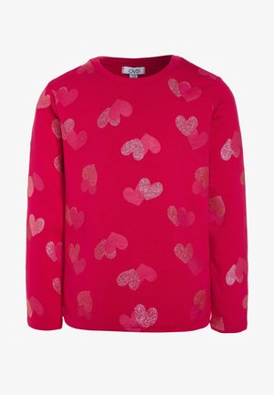 Sweat-shirt pour enfants à manches longues rouge avec des motifs de cœurs roses et pailletés dispersés, col rond, et étiquette de la marque OVS à l'intérieur du col.