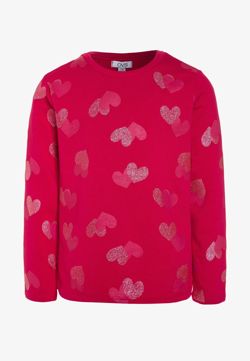 Sweat-shirt pour enfants à manches longues rouge avec des motifs de cœurs roses et pailletés dispersés, col rond, et étiquette de la marque OVS à l'intérieur du col.