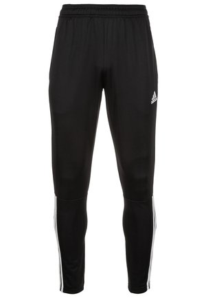Sorte Adidas træningsbukser med hvide sidelstriber og elastisk talje, slank pasform, polyesterstof.