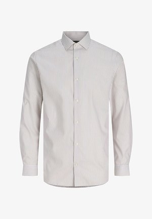 Košulja s dugim rukavima u svijetlo bež boji s tankim okomitim prugama. Ima šiljati ovratnik, zatvaranje sprijeda na gumbe i standardne manžete. Tekstura nalik pamuku.