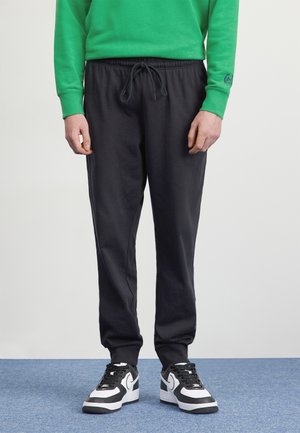 CLUB KNIT JOGGER - Tracksuit bottoms - black/(white)