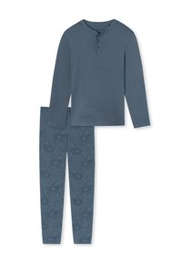 Tmavě modrý dlouhý rukáv henley top s knoflíkovou légou na tři knoflíky, v kombinaci s pyžamovými kalhotami s vzorem, které obsahují abstraktní design ve shodné barvě.