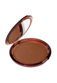 Kompakter Bronzer mit einem glatten, matten, mittleren braunen Puder, untergebracht in einem klaren, bernsteinfarbenen Plastiketui mit Spiegel und Sonnenstrahldesign.