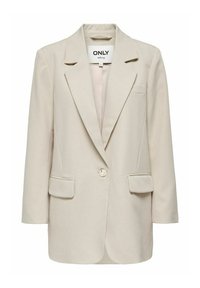 Blazer beige con un cierre de un solo botón, solapas con muesca, dos bolsillos frontales y una textura suave. Etiqueta de la marca visible en el interior.