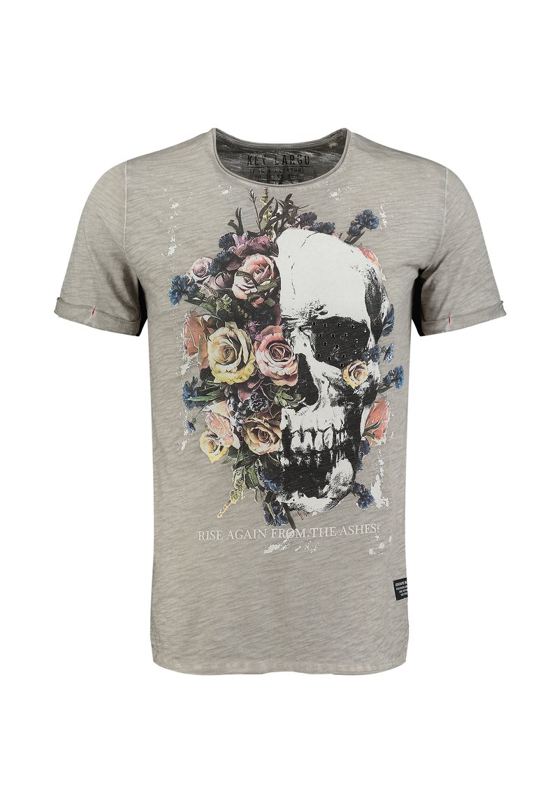 Camiseta de manga corta gris con un gran gráfico de calavera rodeado de flores. El texto dice "¡RESURGE DE LAS CENIZAS!" en blanco.