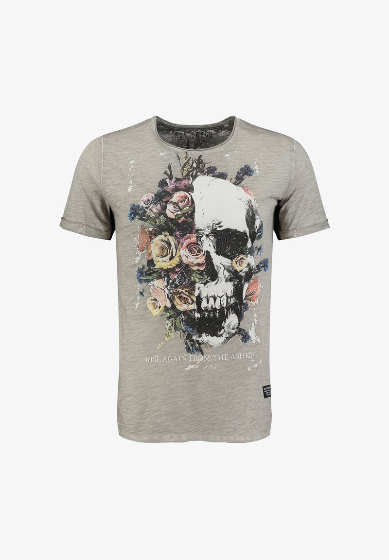 Camiseta de manga corta gris con un gran gráfico de calavera rodeado de flores. El texto dice "¡RESURGE DE LAS CENIZAS!" en blanco.