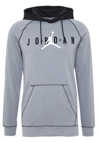 Sudadera gris de manga larga con capucha negra, con un bolsillo frontal, logotipo de Jordan en blanco y letras negras. La costura contrasta en color.