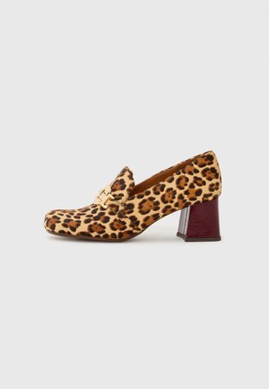 Leopard print pump with a rounded toe, gold hardware accent, and a burgundy block heel, featuring a textured upper.
