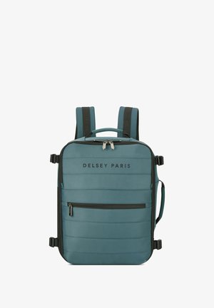 Teal Delsey Paris Rucksack mit gepolstertem Design, zwei verstellbaren Trägern, einem Oberhandgriff und einer vorderen Reißverschlusstasche. Aus Stoffmaterial.