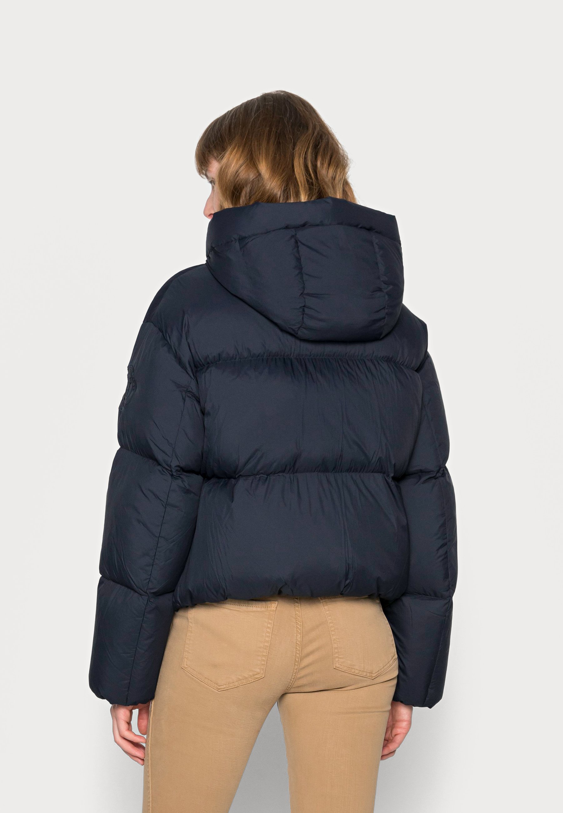 brown puffer jacket