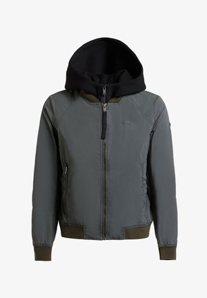 Siva jakna na patentni zatvarač s crnim kapuljačom, rebrastim manžetama i rubom te bočnim džepovima, prikazana na bijeloj pozadini.