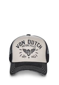 Trekkeru cepure ar bēšas krāsas priekšpusi, melniem sietiem sānos un izliekto vizieri. Priekšpusē ir uzraksts "Von Dutch Motorcycles" ar grafiskajiem elementiem un logo.