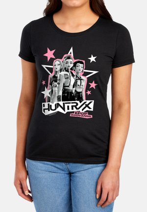 Black T-shirt with three animated female K-pop characters in front of pink and white stars, and "HUNTR/X K-POP DEMON HUNTERS" text below.