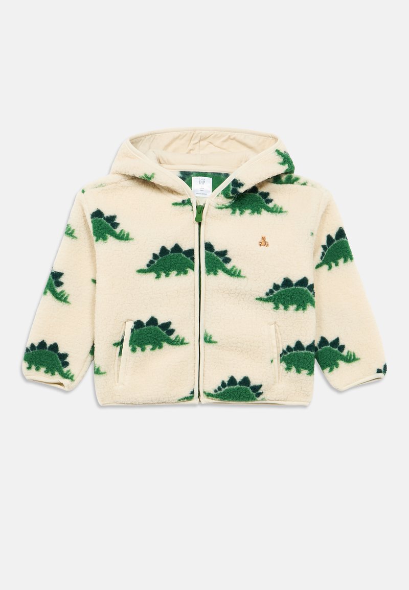 Ζακέτα φλις με φερμουάρ σε κρεμ χρώμα με πράσινο μοτίβο δεινοσαύρου. Διαθέτει επένδυση στην κουκούλα και πλαϊνές τσέπες. Μαλακή υφή, casual σχεδιασμός.