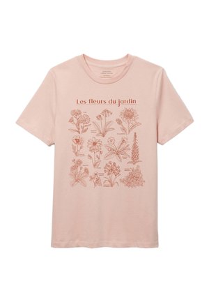 T-shirt rose clair avec illustrations botaniques rouges et texte français "Les fleurs du jardin" représentant diverses fleurs de jardin.