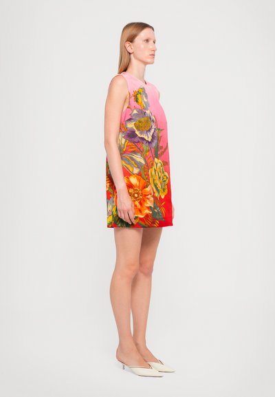 Floral print dress featuring vibrant colors, including pink, orange, and green. Sleeveless design with a loose fit and asymmetrical hem.