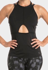 Musta urheilullinen hihaton paita, jossa on korkea kaulus, edessä leikkaus ja vartalonmyötäinen malli. Valmistettu sileästä, joustavasta materiaalista.