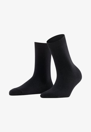 Schwarze Baumwollsocken mit geripptem Bündchen, die eine glatte Textur und eine standardmäßige Crew-Länge aufweisen. Ideal für den täglichen Gebrauch.