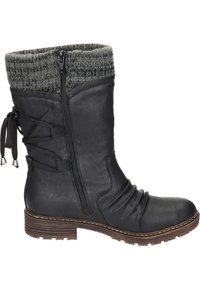 Schwarze Leder-Stiefelette mit einem gestrickten grauen Schaft, seitlichem Reißverschluss und dekorativen Schnürsenkeln, ausgestattet mit einer strukturierten, geriffelten Sohle und einem braunen, gestapelten Absatz.