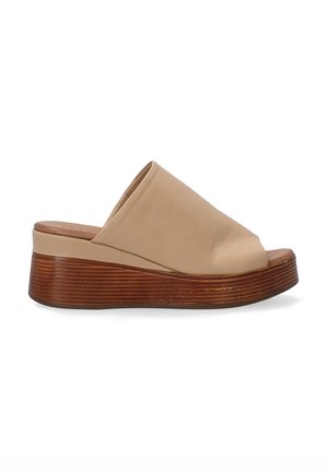 Beige leather wedge sandals with an open toe, featuring a smooth upper and a ribbed wooden platform heel for stability and comfort.
