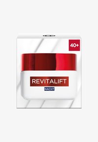 Revitalift nattkräm i en vit burk med ett glansigt rött lock. Förpackningen har fet stil och en 40+ indikator i det övre högra hörnet.