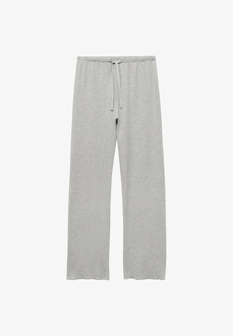 Sivé bavlnené tepláky s elastickým pásom na šnúrku, rovného strihu a príjemnou, ľahkou textúrou. Žiadne viditeľné vzory ani kovové prvky.