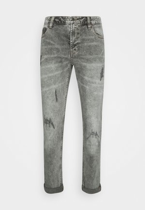 Blugi din denim gri cu un finisaj decolorat, având detalii distressed și manșete răsucite. Design cu cinci buzunare și croială dreaptă.