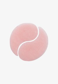 Patches pour les yeux en silicone rose, de forme incurvée comme un yin-yang, avec une surface texturée présentant un motif subtil en grille.