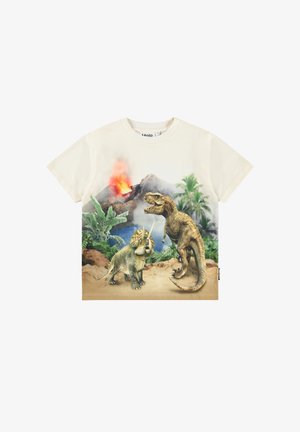 T-shirt color crema con una grafica colorata di dinosauri, inclusi un triceratopo e un T-Rex, su uno sfondo vulcanico con foglie di palma.