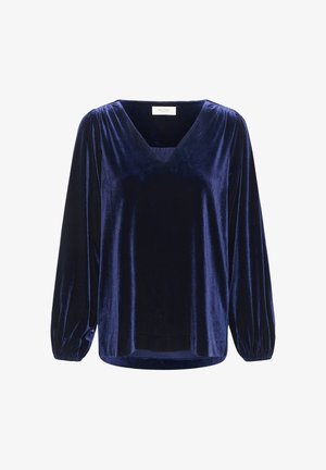 Navy blue velvet top with a V-neck, long puff sleeves, and a relaxed fit. Smooth texture with subtle sheen; high-quality fabric.
