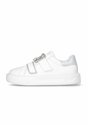 White sneakers with a smooth leather upper, double Velcro straps, silver accents, and a textured rubber sole. Brand name "LIU-JO" on the side.