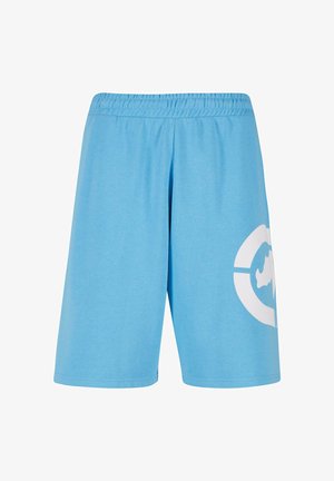 Sinised lühikesed püksid pehmest kangast, millel on elastne vöökoht ja suur valge graafiline disain vasakul säärel.