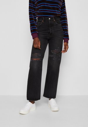 Jeans a sigaretta - destroyed denim