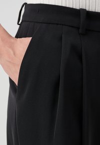 DRYKORN INK - Kelnės - black