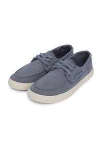 Dunkelblaue Leinensneaker mit weißen Gummisohlen, ausgestattet mit Schnürverschlüssen, Kontrastnähten und einem runden Zehendesign.