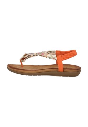 Sandalia plana con suela marrón claro, tira trasera elástica naranja y tira en forma de tira trenzada con estampado floral.