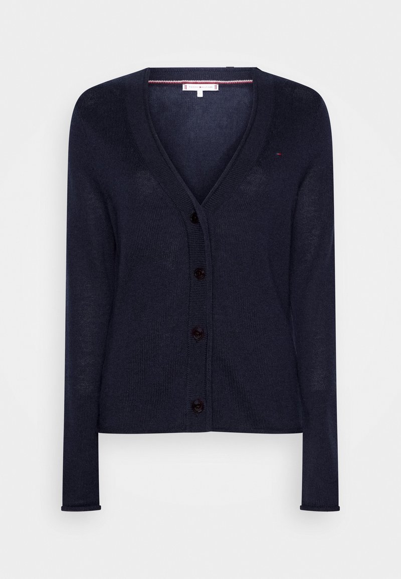 Navy cardigan, lightweight knit, V-neck, seven front buttons, long sleeves, ribbed cuffs and hem, minimal design, soft texture.