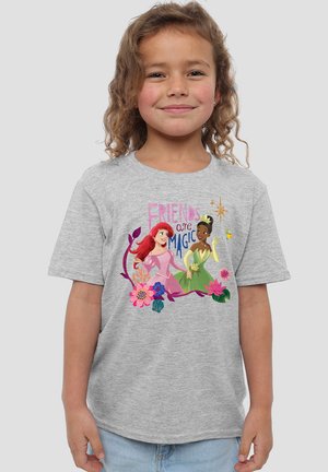 Gray t-shirt with short sleeves featuring a colorful graphic of two animated characters surrounded by flowers and the text "FRIENDS are MAGIC."