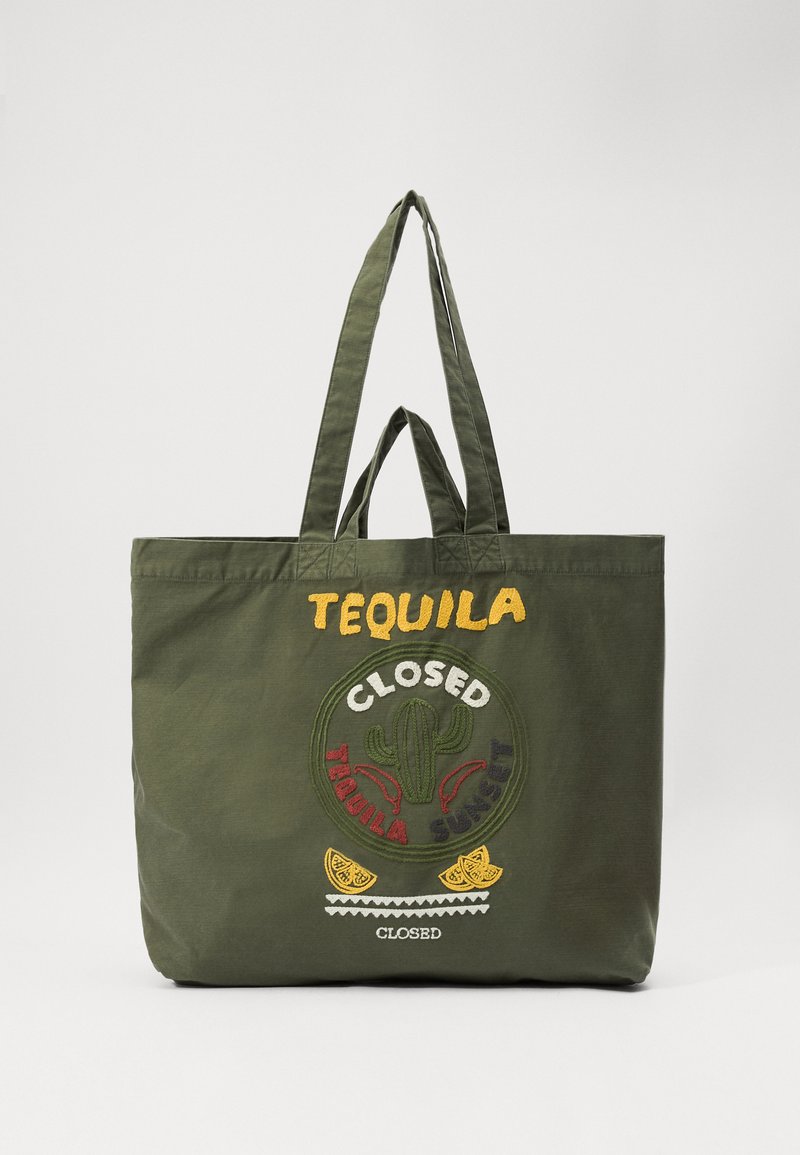 Sac fourre-tout en toile vert olive avec deux anses, orné de broderies jaunes et multicolores, ainsi que d'accents décoratifs en citron.
