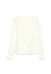 Long-sleeve top in white fabric, featuring a smooth texture and ruched detail on the side, round neckline, and fitted silhouette.