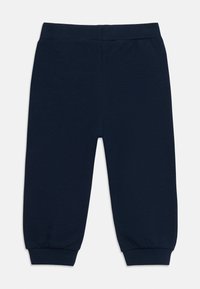 Σκούρο μπλε φόρμα για νήπια με ελαστική μέση και ελαστικές μανσέτες, απλό σχέδιο, απλωμένο σε λευκό φόντο.