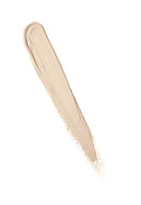 Trait de crème beige avec une texture lisse et un léger éclat, appliqué en ligne effilée sur un fond blanc.