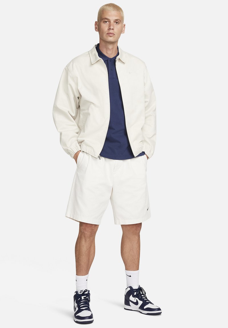 Nike Sportswear Poloshirt donkerblauw