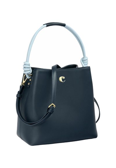 Navy leather handbag with a light blue handle featuring a knotted detail. Includes a gold logo and a detachable shoulder strap.