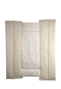 Cot kit with a cream-colored cotton cover featuring a star and moon pattern. Includes quilted sides for added comfort and safety.