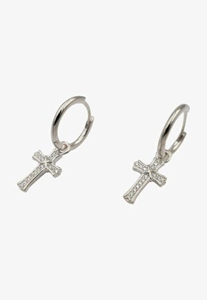 Boucles d'oreilles en argent en forme de créoles avec de petits pendentifs en croix, ornées d'accents en pierres précieuses transparentes et d'une finition polie. Design détaillé de la croix et texture lisse.