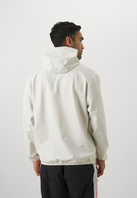 Under Armour UNSTOPPABLE  - Hættetrøje - summit white/white