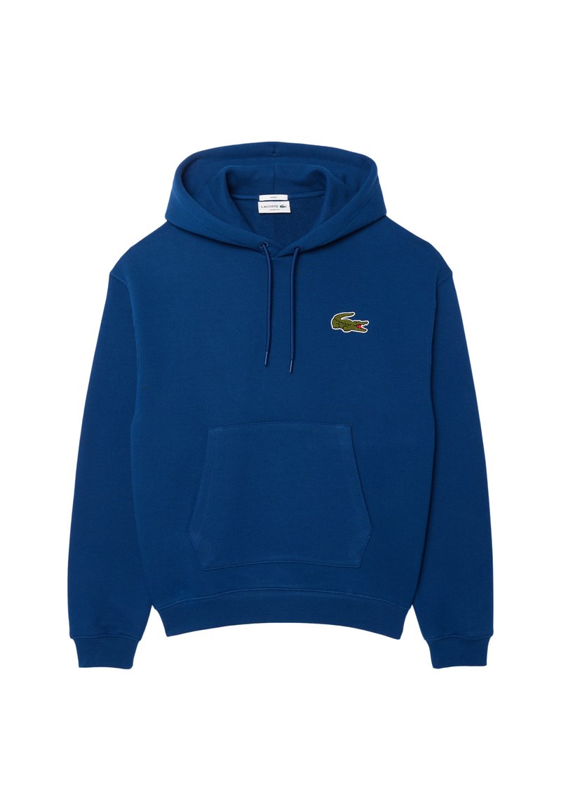 Sudadera azul hecha de una mezcla de algodón, con un bolsillo tipo canguro, cordón ajustable y un logo de cocodrilo bordado en verde en el pecho.